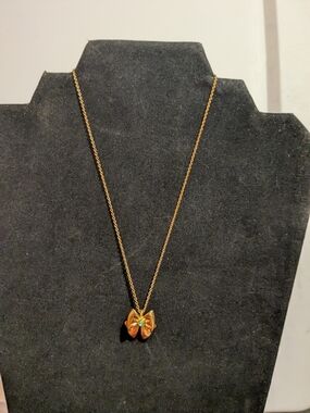Avon Gold Bow Pendant Necklace with Center Stone